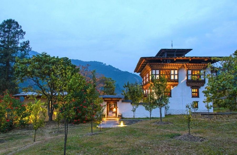 Amankora Punakha lodge entrance among trees