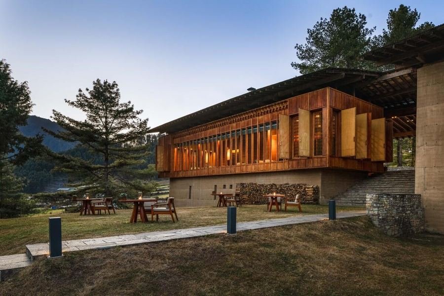 Amankora Gangtey lodge exterior at dusk