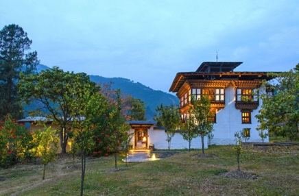 Amankora lodge set among pines in a Bhutanese valley