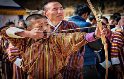 Bhutanese archers competing in the national sport