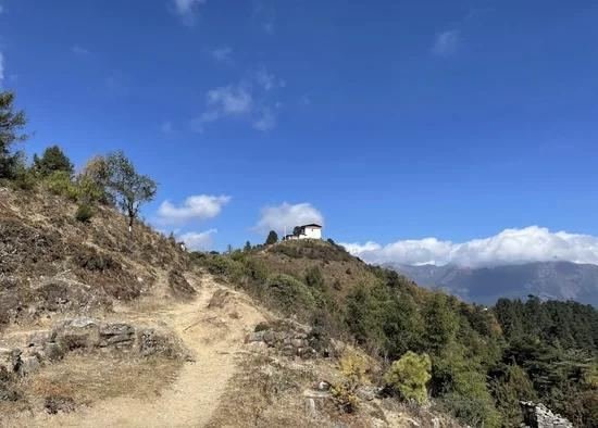 Trail climbing towards the ridge above Paro