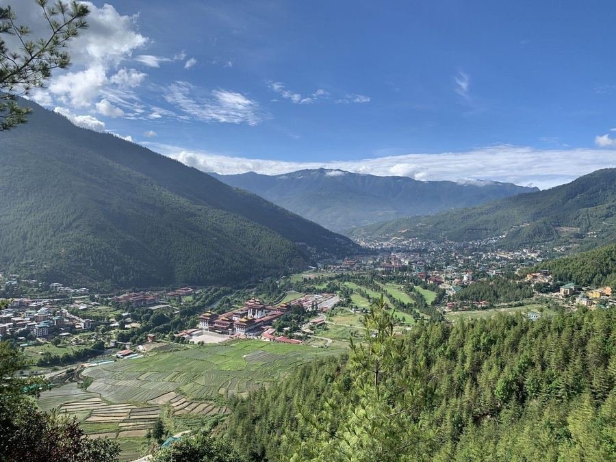 Broad valley view on the descent to Thimphu
