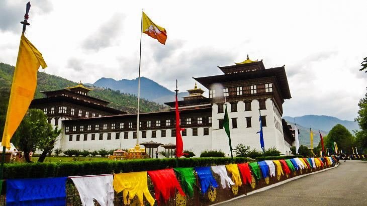 Tashichho Dzong with prayer flags, Thimphu