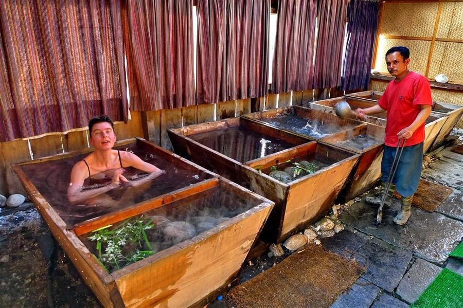 Traditional Bhutanese hot stone bath