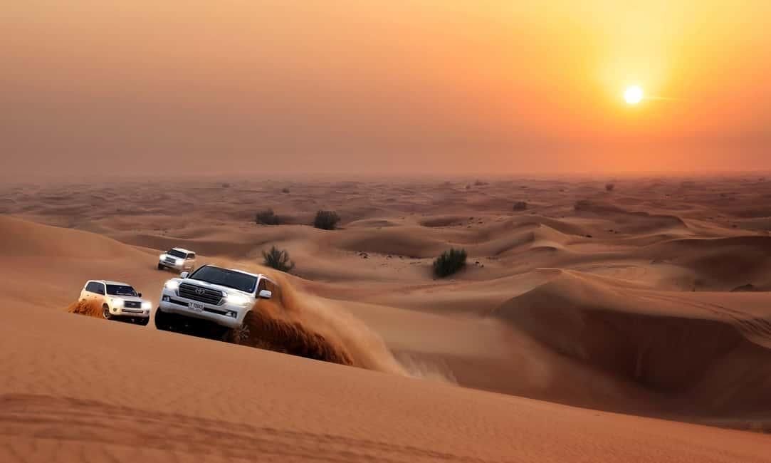 Desert safari at sunset in the Arabian Desert