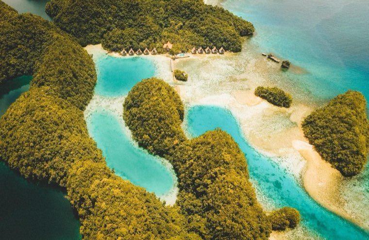Aerial view of the limestone islets and turquoise channels of Sohoton Cove