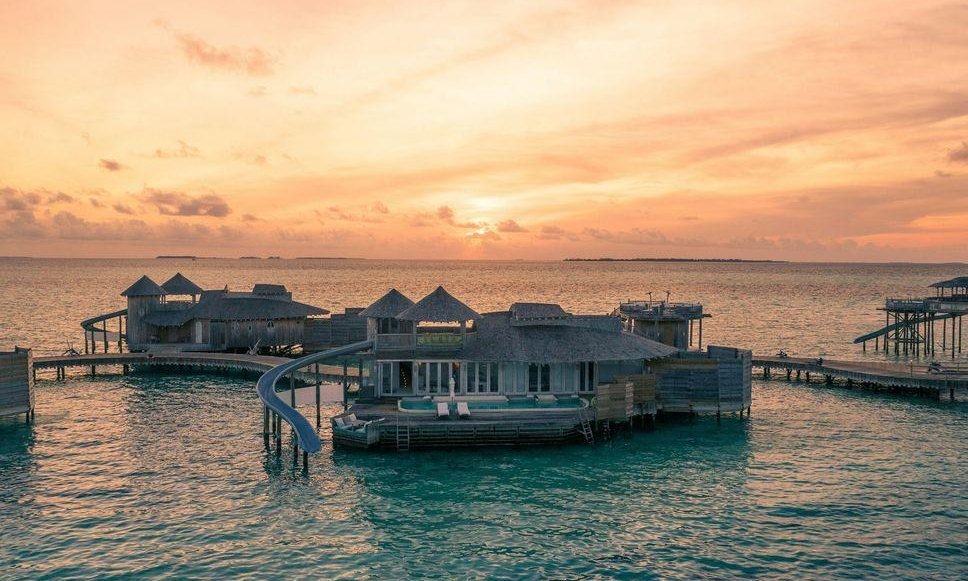 Overwater villas at sunset, Soneva Jani, Maldives